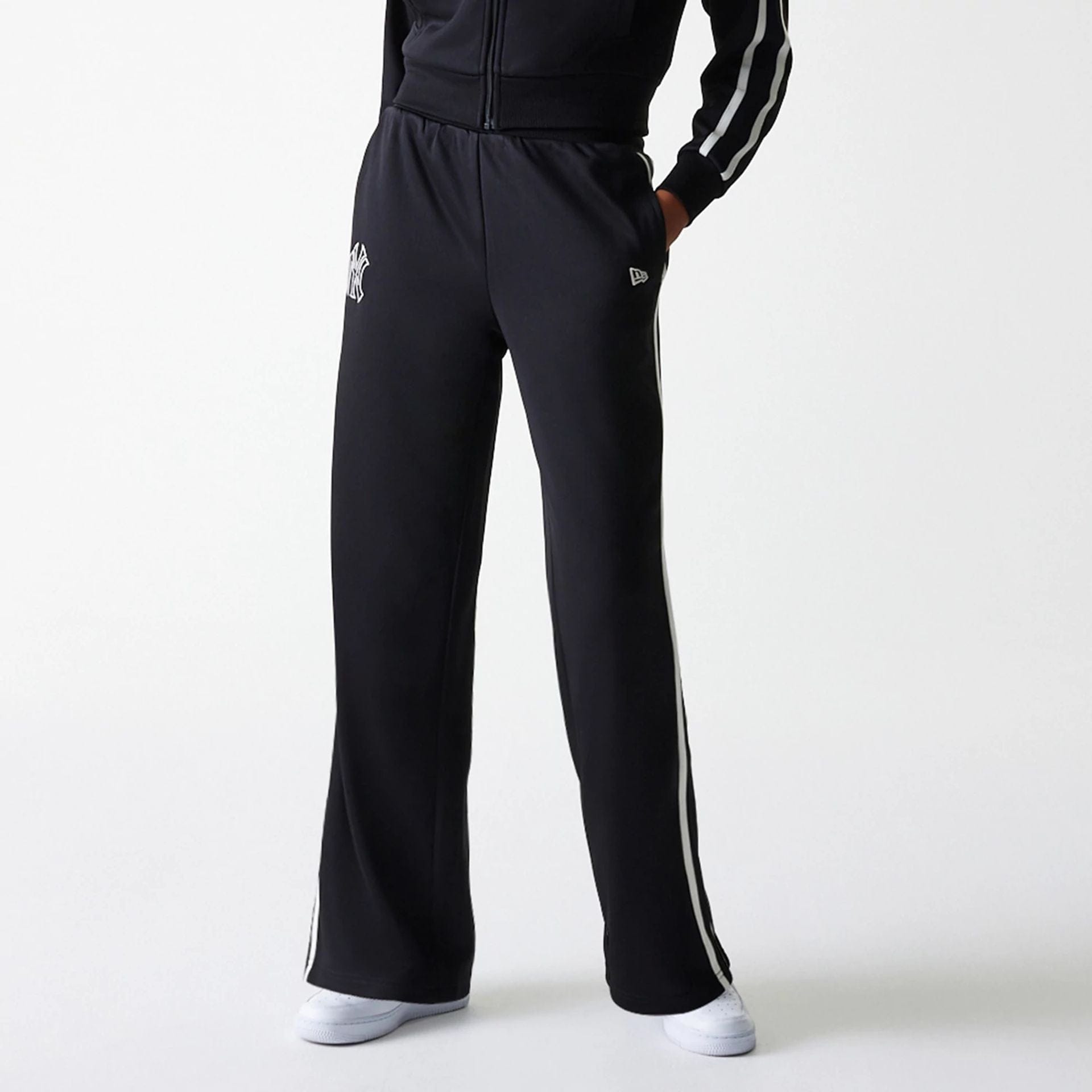 The Female model is wearing New York Yankees Womens MLB Midi Logo Black Track Pants 6