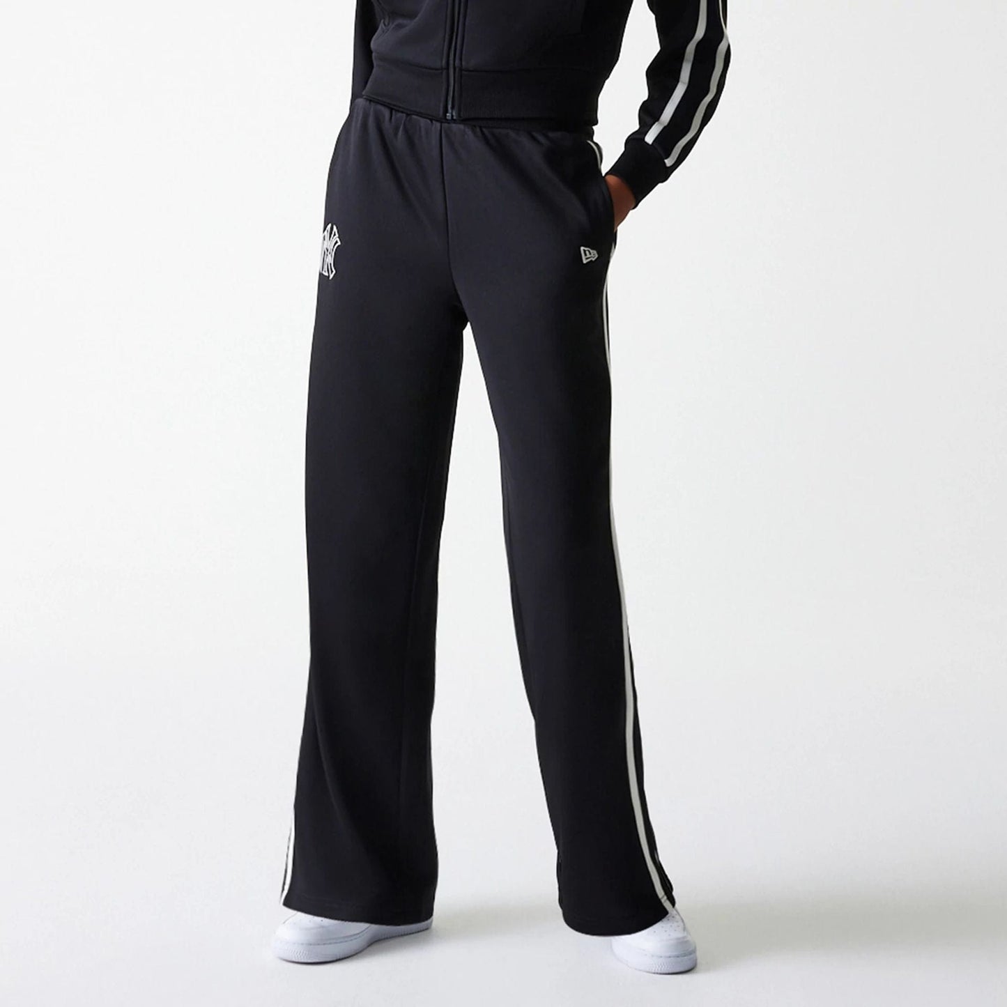 The Female model is wearing New York Yankees Womens MLB Midi Logo Black Track Pants 6