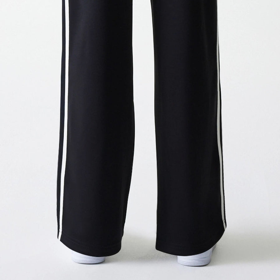 The Female model is wearing New York Yankees Womens MLB Midi Logo Black Track Pants 7