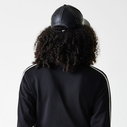 The Female model is wearing New York Yankees Womens MLB Midi Logo Black Track Jacket 6