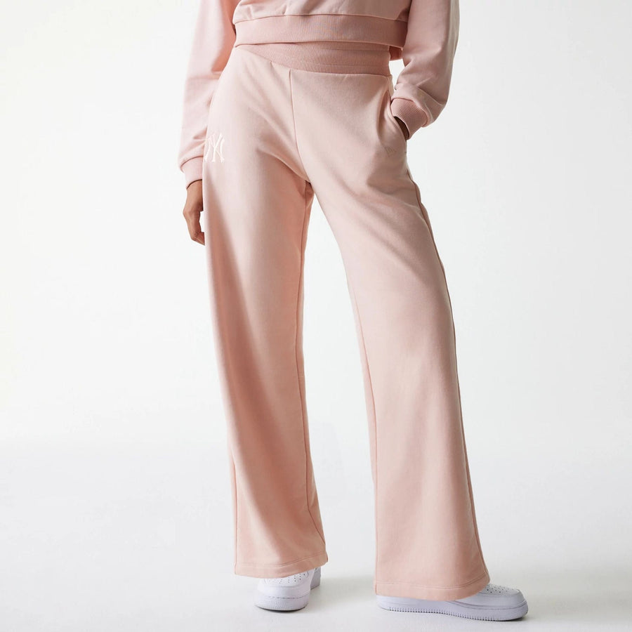 The Female model is wearing New York Yankees Womens MLB Tonal Pastel Pink Straight Leg Joggers 1