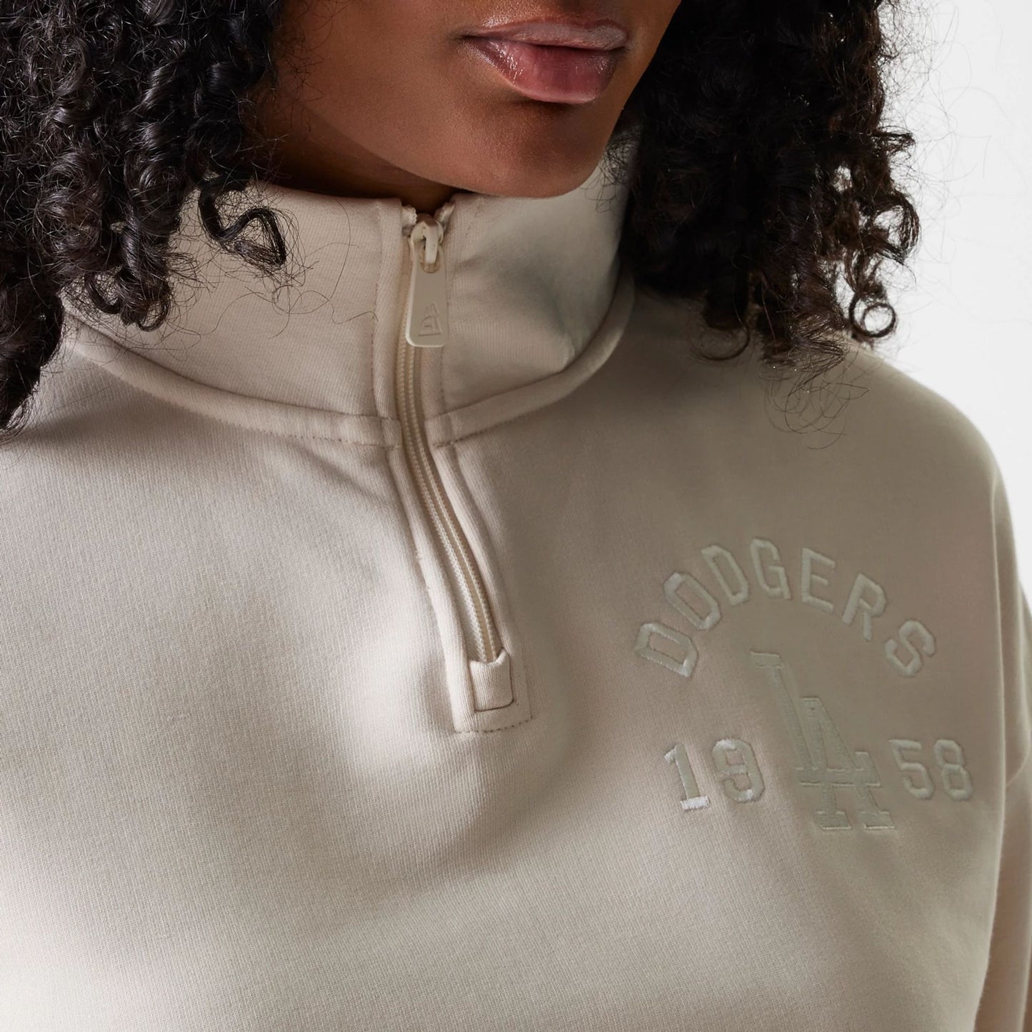 The Female model is wearing LA Dodgers Womens MLB Tonal Light Beige Cropped 1/4 Zip Sweater 4