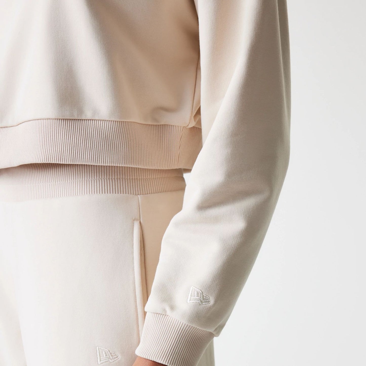 The Female model is wearing LA Dodgers Womens MLB Tonal Light Beige Cropped 1/4 Zip Sweater 5