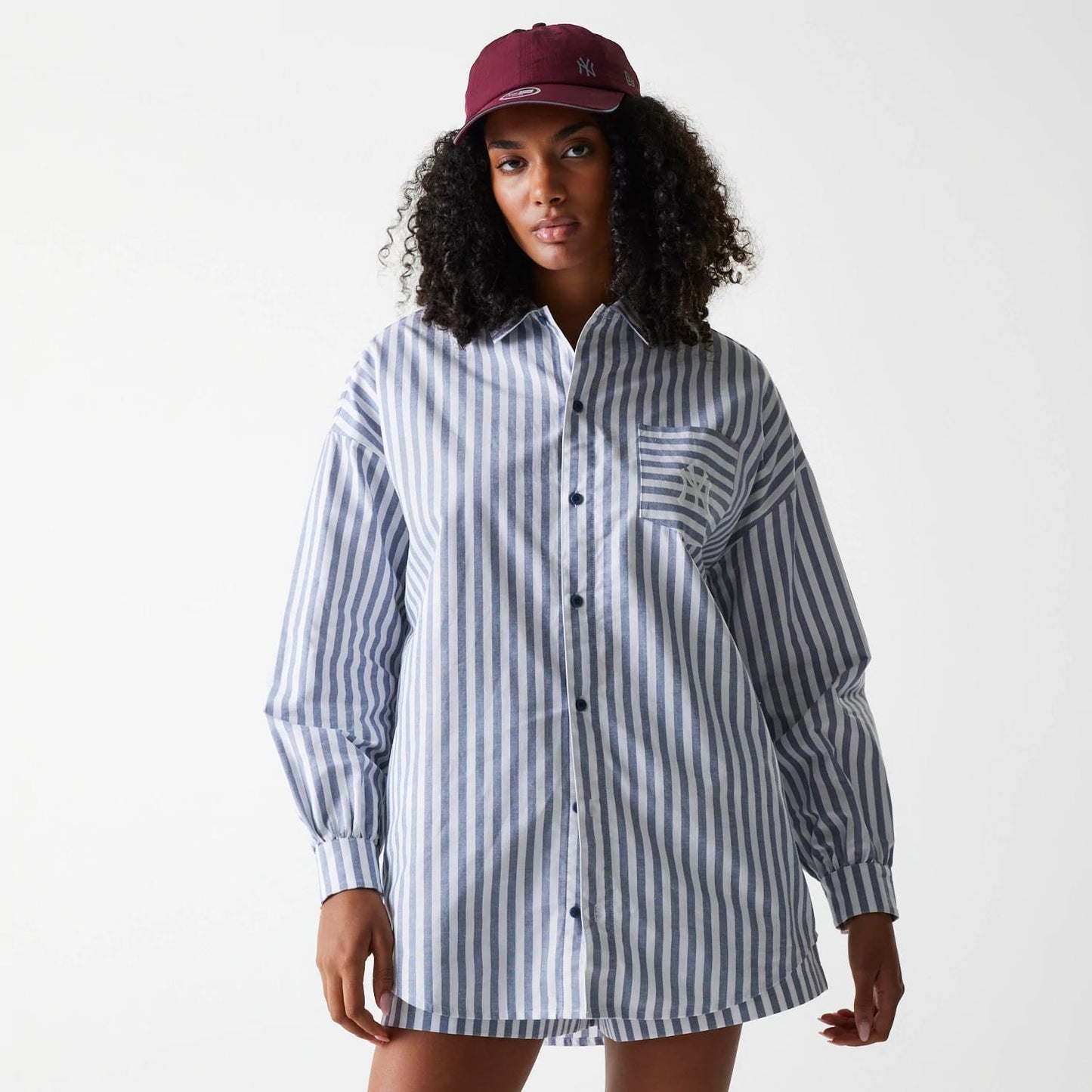 The Female model is wearing New York Yankees Womens MLB Stripe Dark Blue Long Sleeve Shirt 1