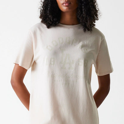 The Female model is wearing LA Dodgers Womens MLB Tonal Graphic Light Beige Oversized T-Shirt 3