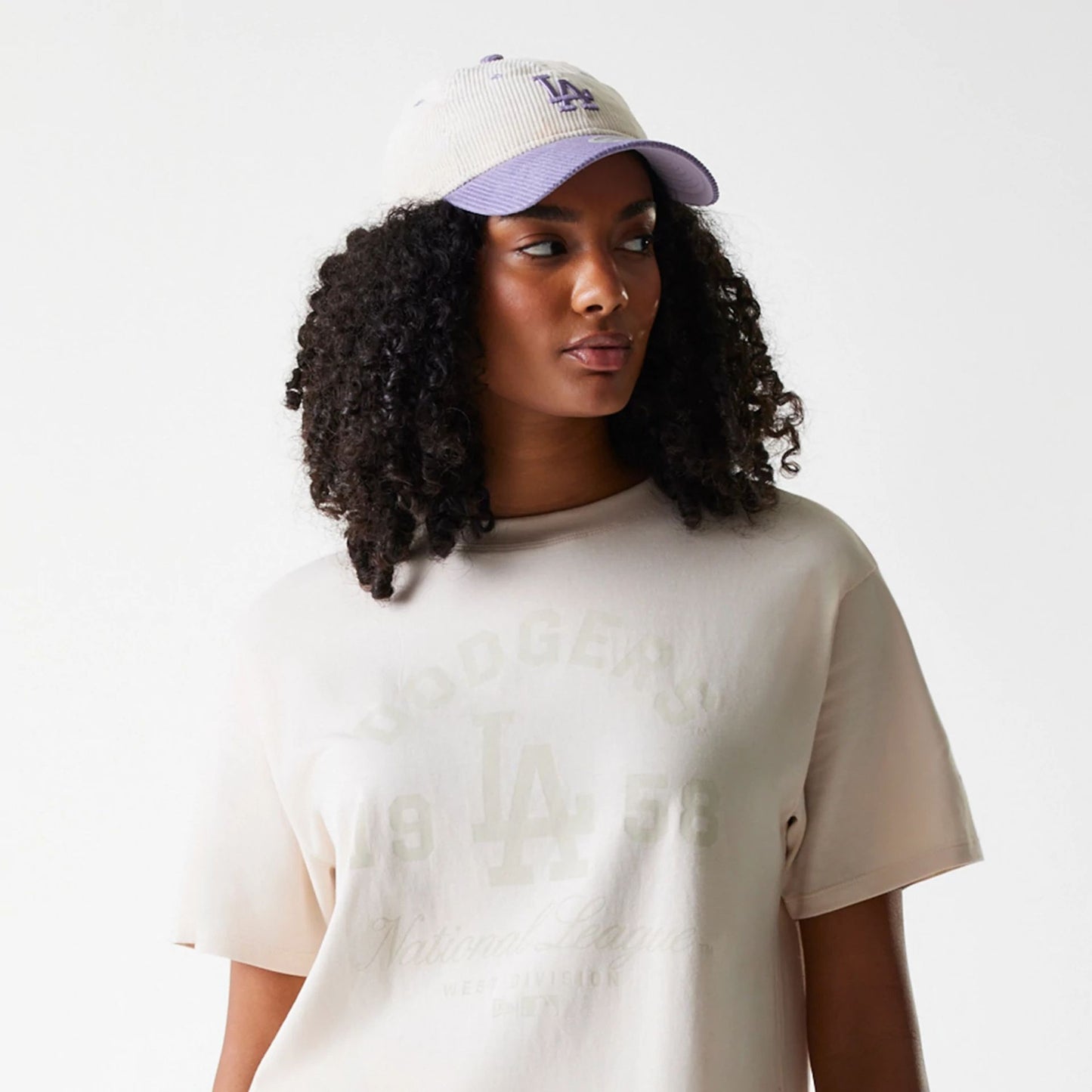 The Female model is wearing LA Dodgers Womens MLB Tonal Graphic Light Beige Oversized T-Shirt 6
