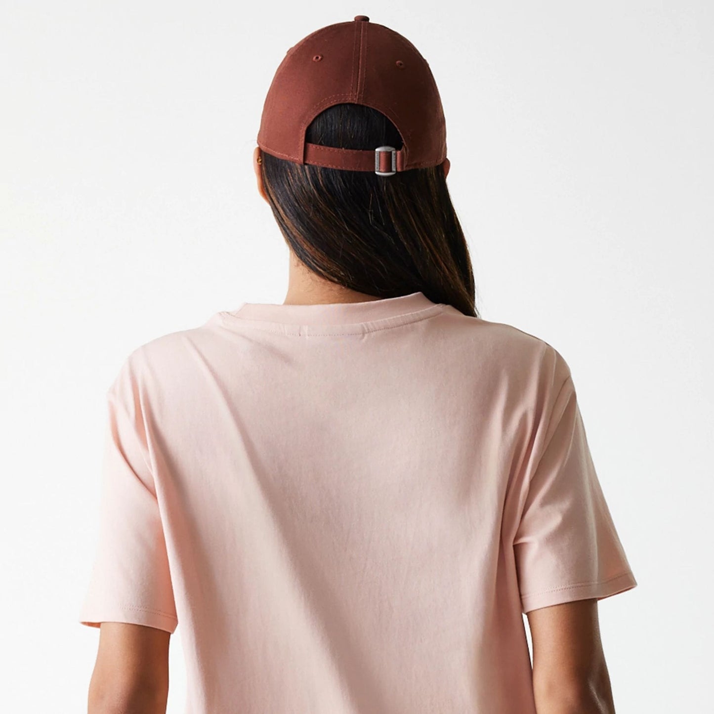 The Female model is wearing New York Yankees Womens MLB Tonal Graphic Pastel Pink Oversized T-Shirt 4