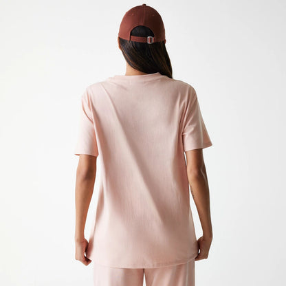 The Female model is wearing New York Yankees Womens MLB Tonal Graphic Pastel Pink Oversized T-Shirt 2