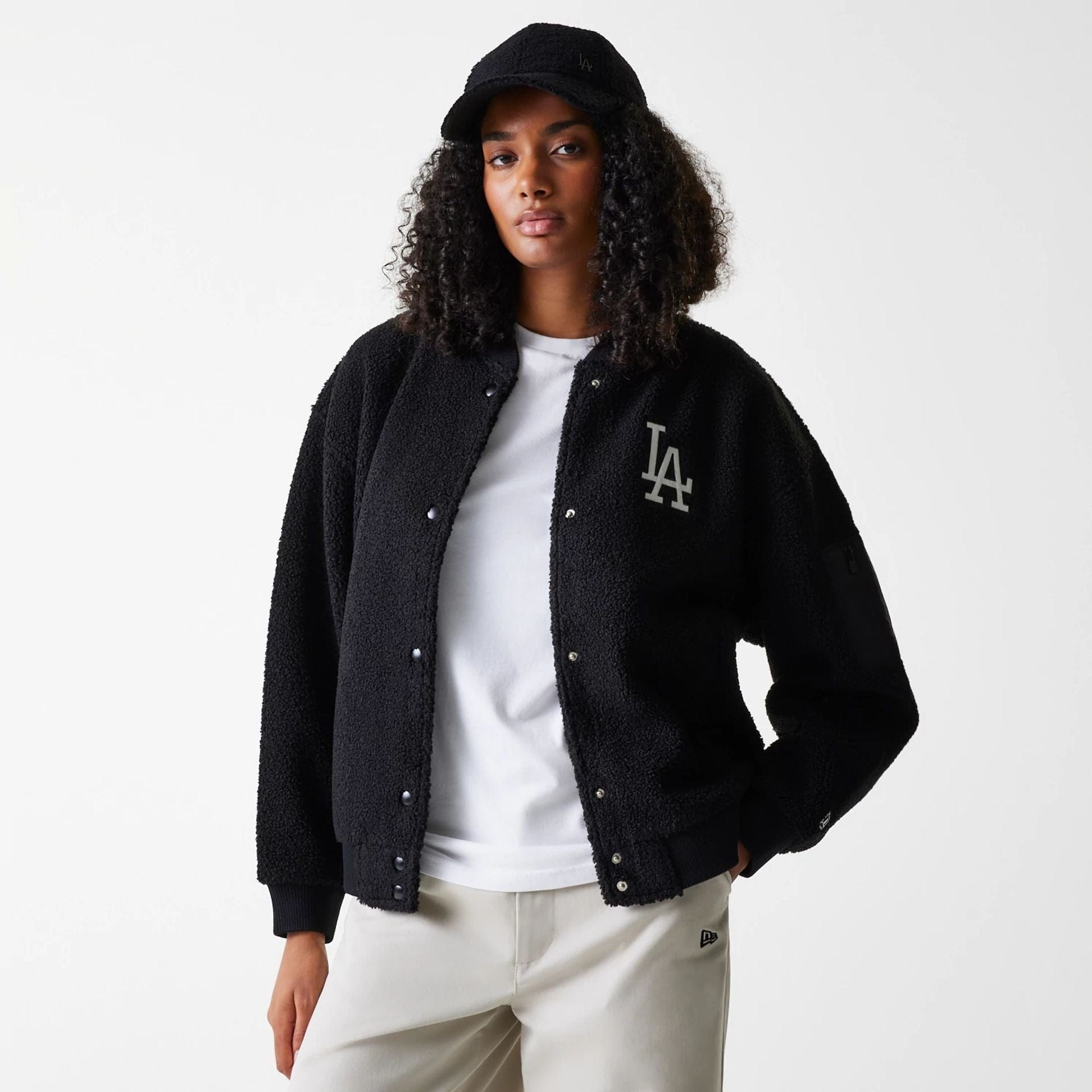 The Female model is wearing LA Dodgers Womens MLB Black Oversized Sherpa Bomber Jacket 2