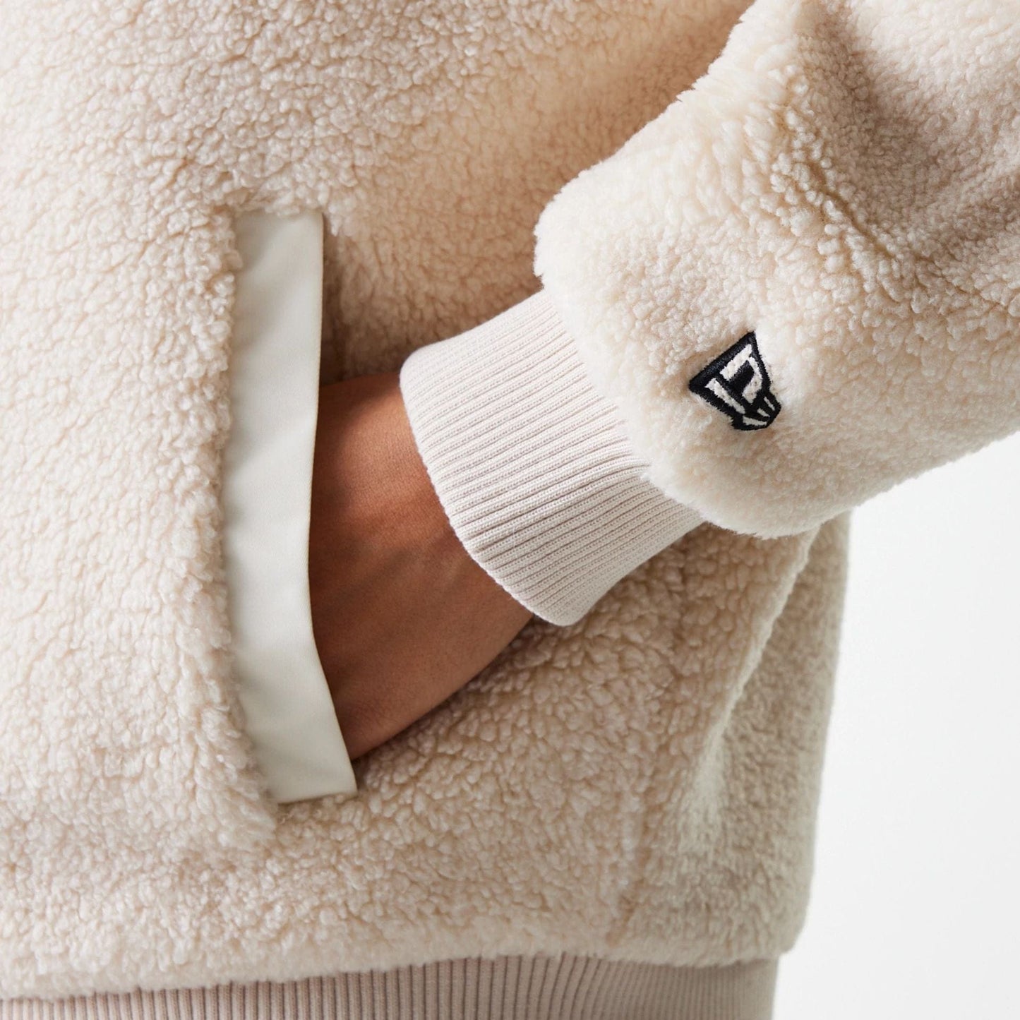 The Female model is wearing New York Yankees Womens MLB Light Beige Oversized Sherpa Bomber Jacket 6