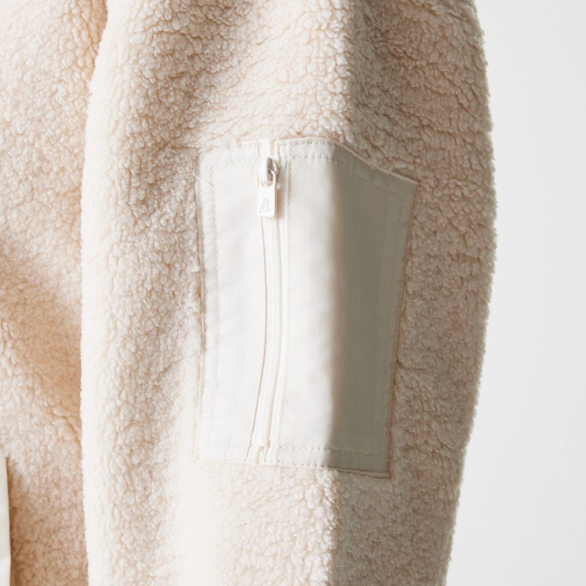 The Female model is wearing New York Yankees Womens MLB Light Beige Oversized Sherpa Bomber Jacket 4