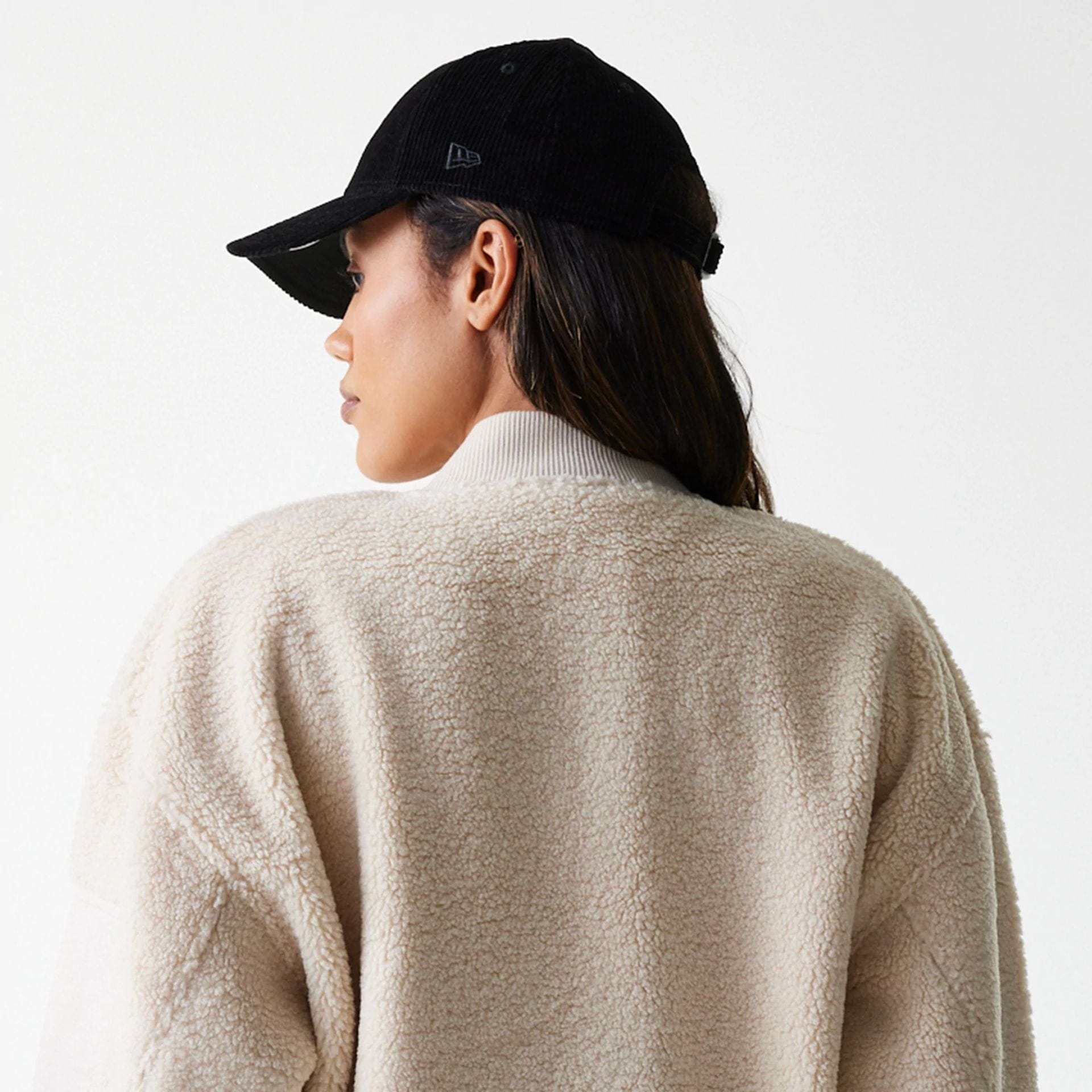 The Female model is wearing New York Yankees Womens MLB Light Beige Oversized Sherpa Bomber Jacket 7