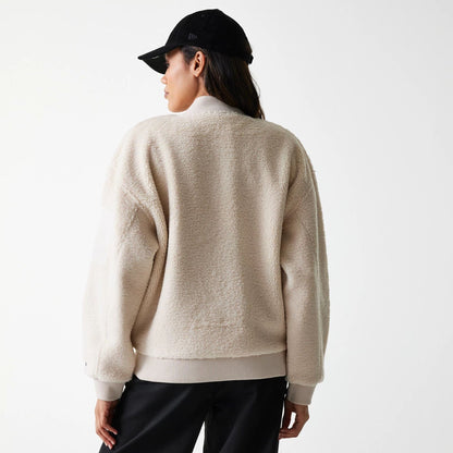 The Female model is wearing New York Yankees Womens MLB Light Beige Oversized Sherpa Bomber Jacket 2