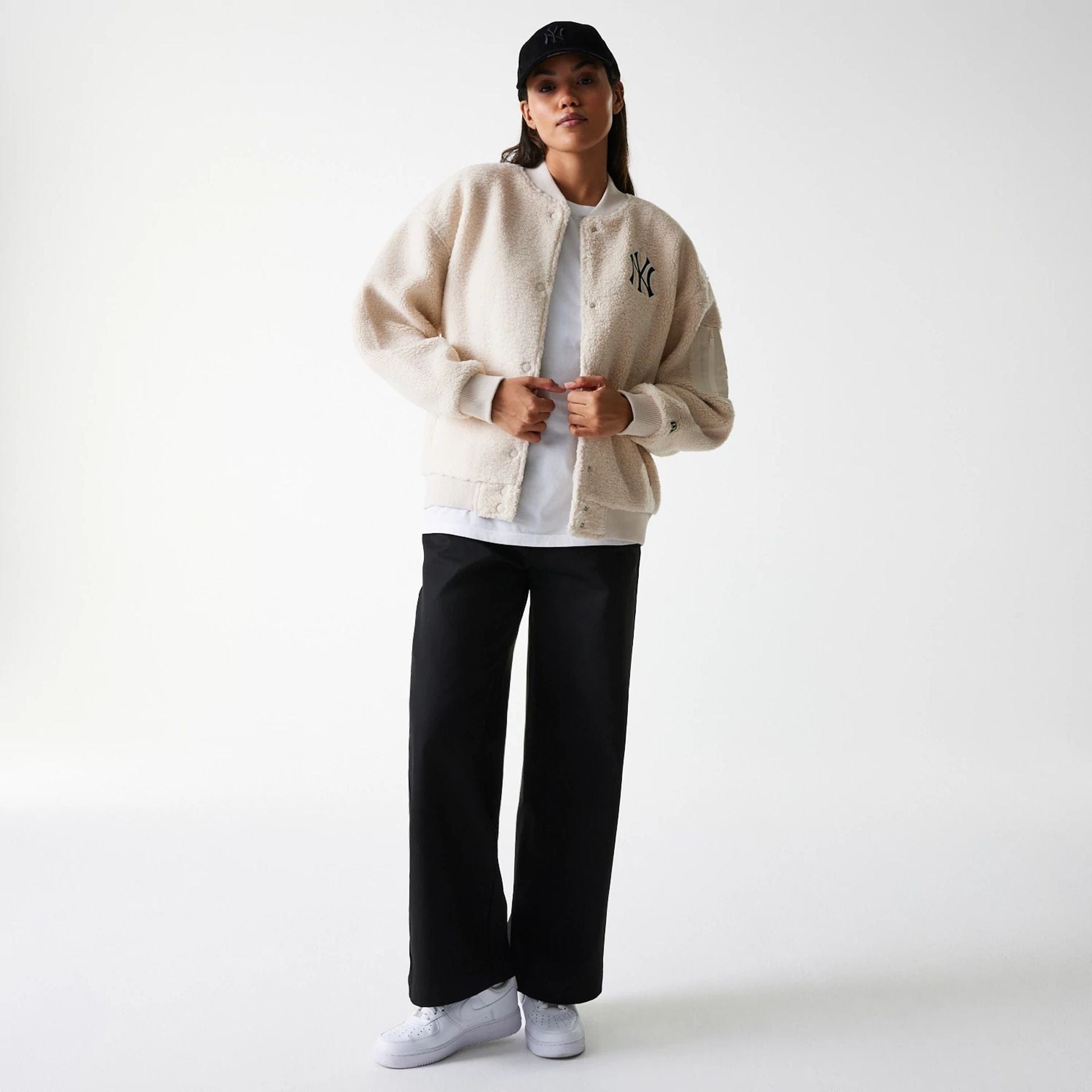 The Female model is wearing New York Yankees Womens MLB Light Beige Oversized Sherpa Bomber Jacket 8