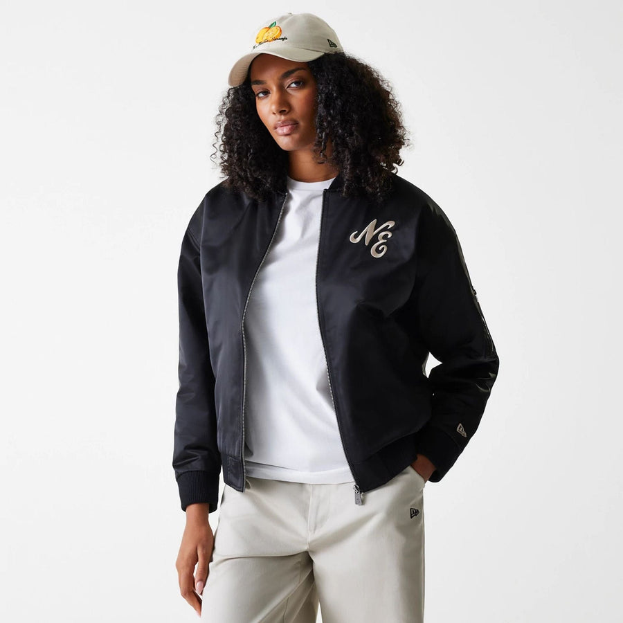 The Female model is wearing Womens New Era Satin Black Satin Bomber Jacket 3