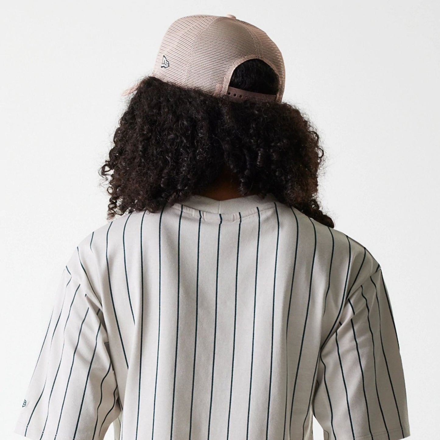 The Female model is wearing Womens New Era Pinstripe Light Beige Crop T-Shirt 6