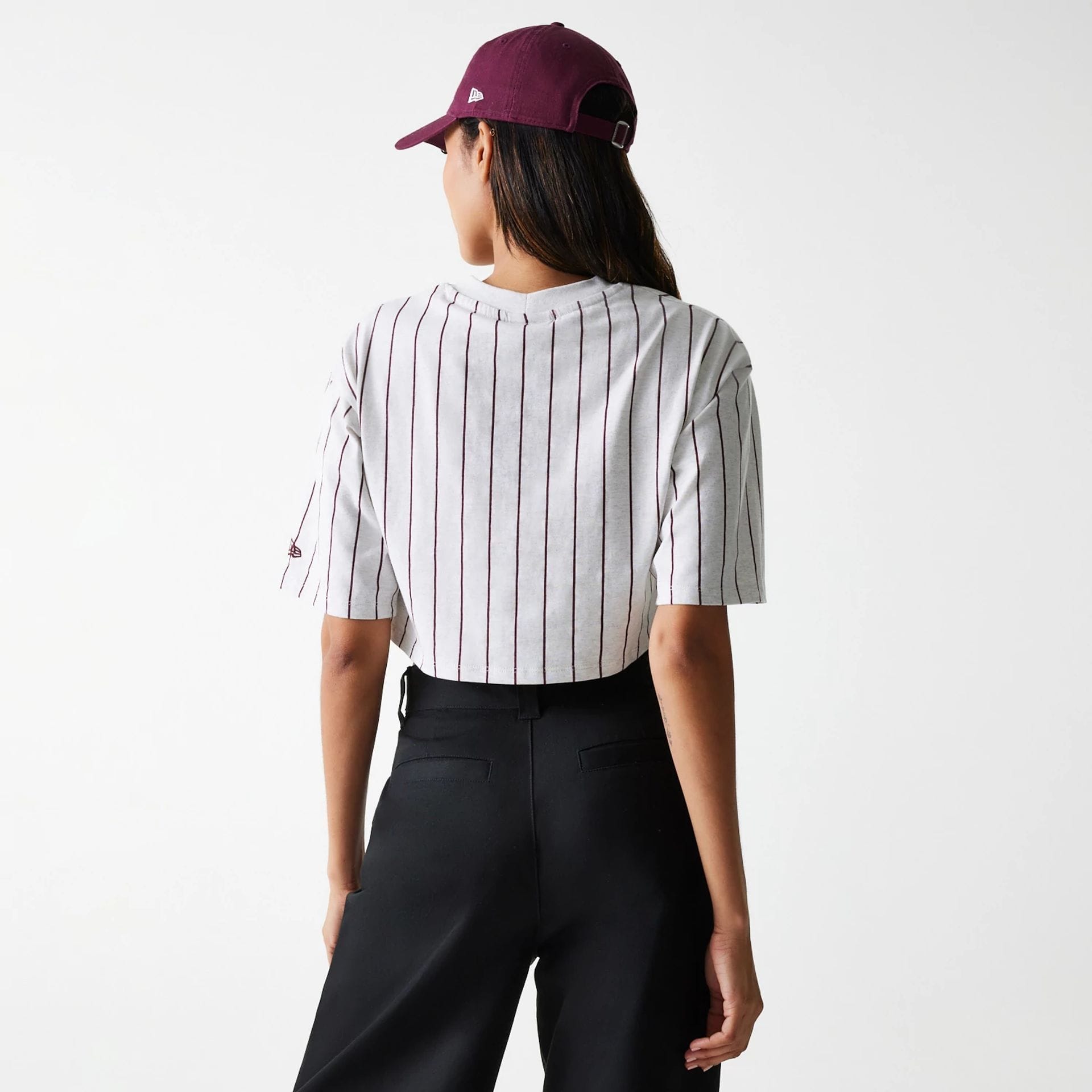 The Female model is wearing Womens New Era Pinstripe Pastel Grey Crop T-Shirt 2