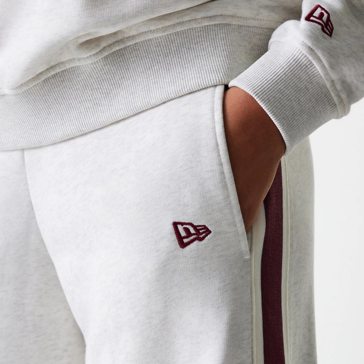 The Female model is wearing Womens New Era Pastel Grey Straight Leg Joggers 4