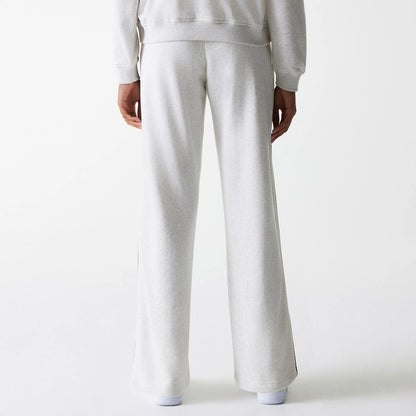 The Female model is wearing Womens New Era Pastel Grey Straight Leg Joggers 2