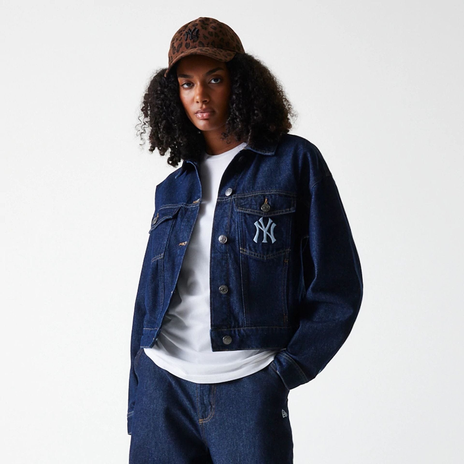 The Female model is wearing New York Yankees Womens MLB Dark Blue Denim Jacket 3