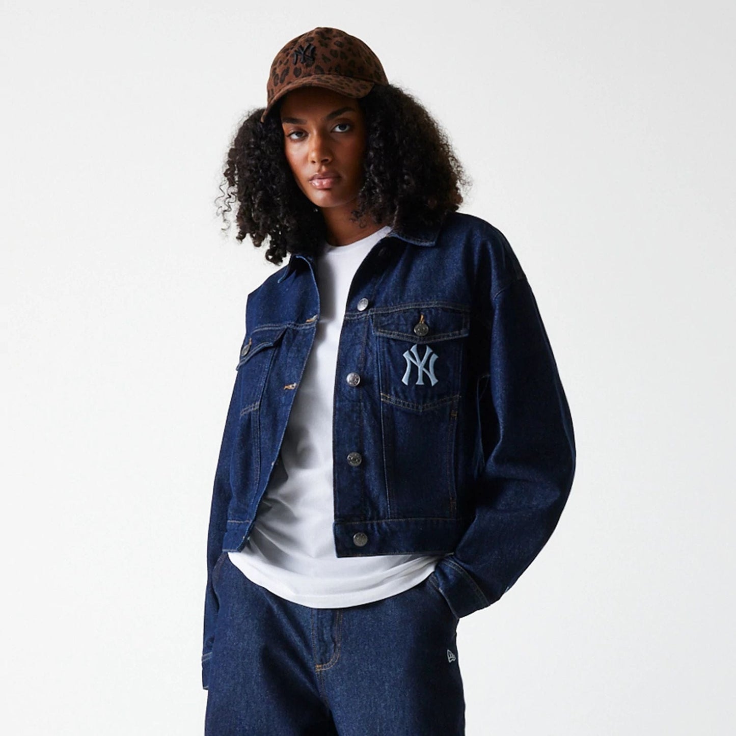 The Female model is wearing New York Yankees Womens MLB Dark Blue Denim Jacket 3