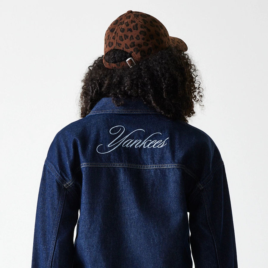 The Female model is wearing New York Yankees Womens MLB Dark Blue Denim Jacket 7