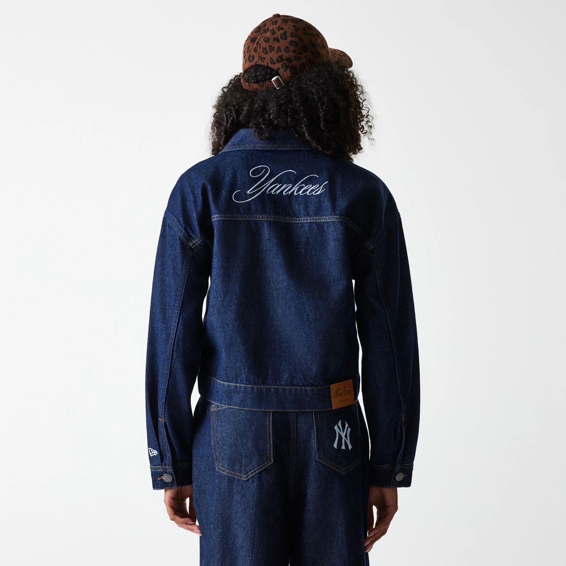 The Female model is wearing New York Yankees Womens MLB Dark Blue Denim Jacket 2