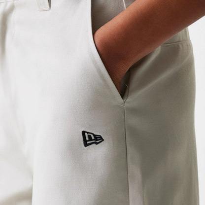 The Female model is wearing Womens New Era Light Beige Wide Leg Chino Trousers 6