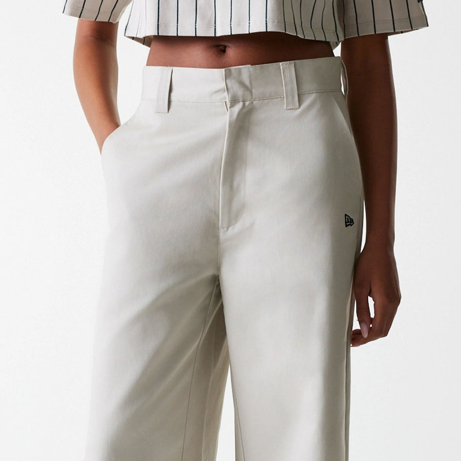 The Female model is wearing Womens New Era Light Beige Wide Leg Chino Trousers 7