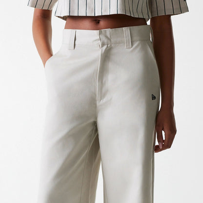 The Female model is wearing Womens New Era Light Beige Wide Leg Chino Trousers 7