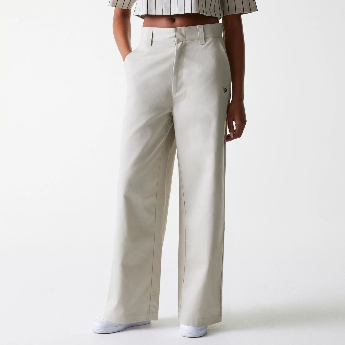 The Female model is wearing Womens New Era Light Beige Wide Leg Chino Trousers 4