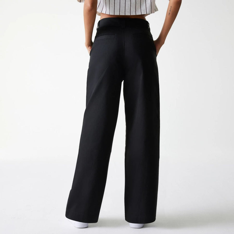 The Female model is wearing Womens New Era Black Wide Leg Chino Trousers 2