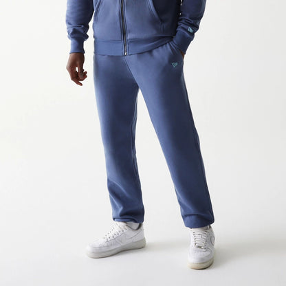 The Male model is wearing LA Dodgers MLB Midi League Essential Dark Blue Joggers 6