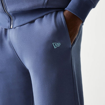 The Male model is wearing LA Dodgers MLB Midi League Essential Dark Blue Joggers 5