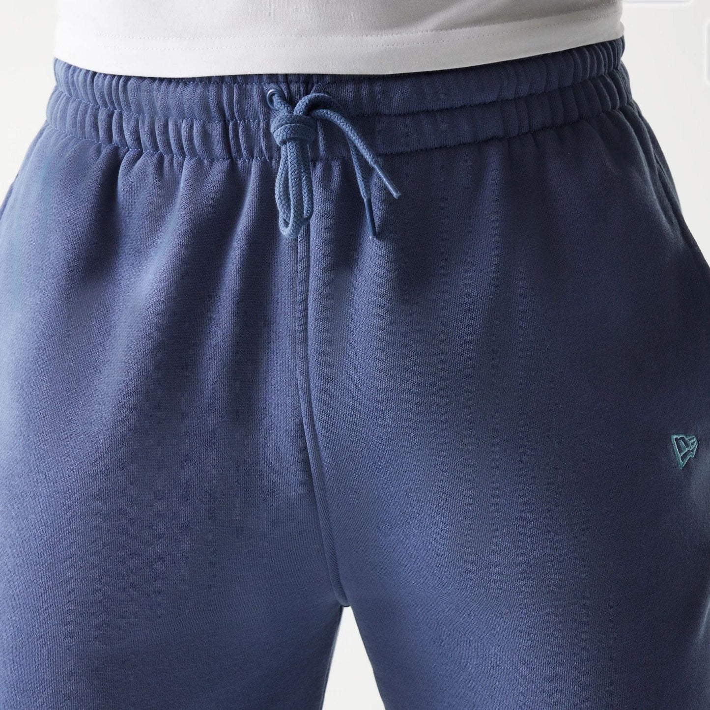 The Male model is wearing LA Dodgers MLB Midi League Essential Dark Blue Joggers 4