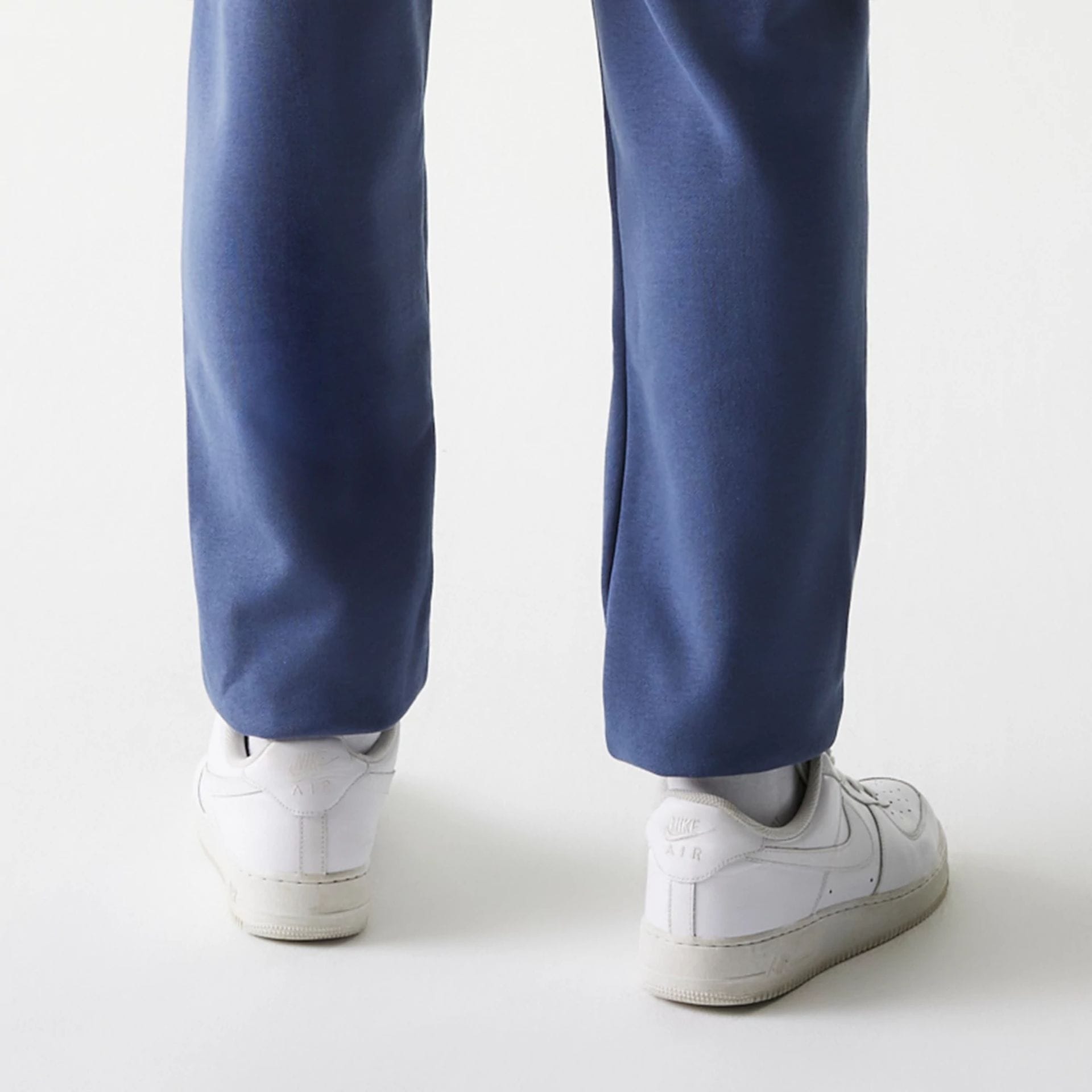 The Male model is wearing LA Dodgers MLB Midi League Essential Dark Blue Joggers 7