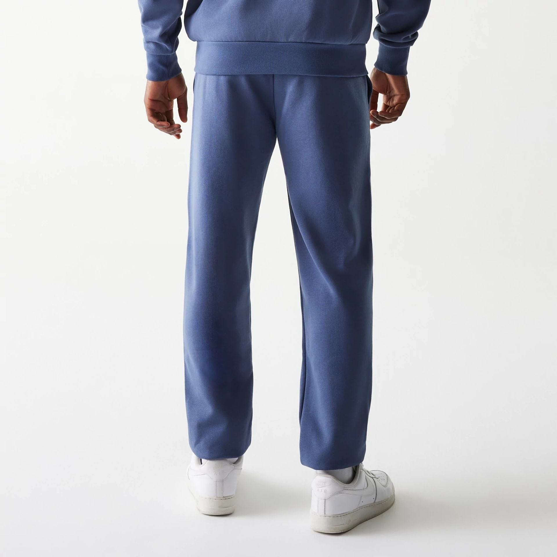 The Male model is wearing LA Dodgers MLB Midi League Essential Dark Blue Joggers 2