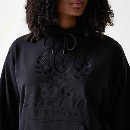 Womens New Era Crest Black Pullover Hoodie, front view showing a raised crest design with N.E centred on the chest above a large raised New Era script and Buffalo, New York text, with a drawstring hood at the top.