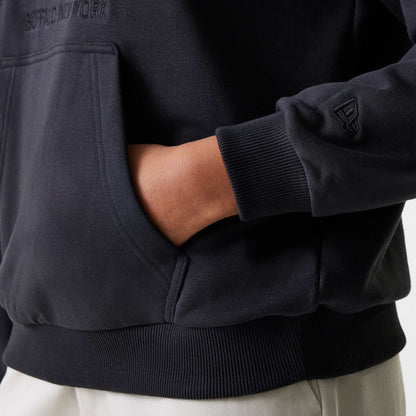 The Female model is wearing Womens New Era Crest Black Pullover Hoodie 7