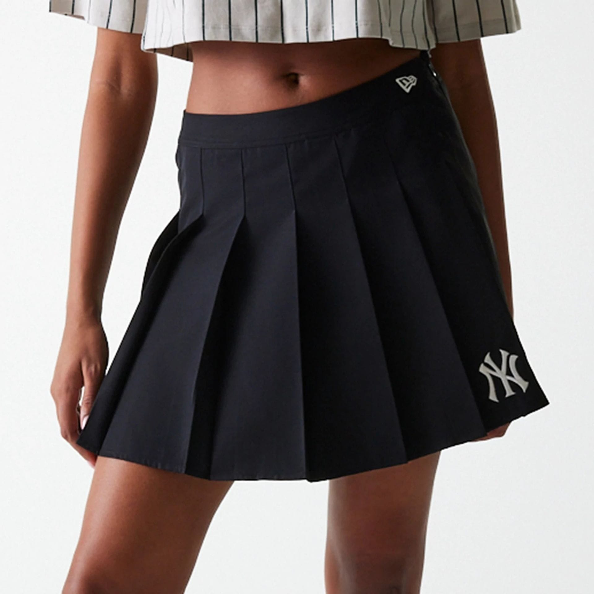 The Female model is wearing New York Yankees Womens MLB Black Tennis Skirt 3