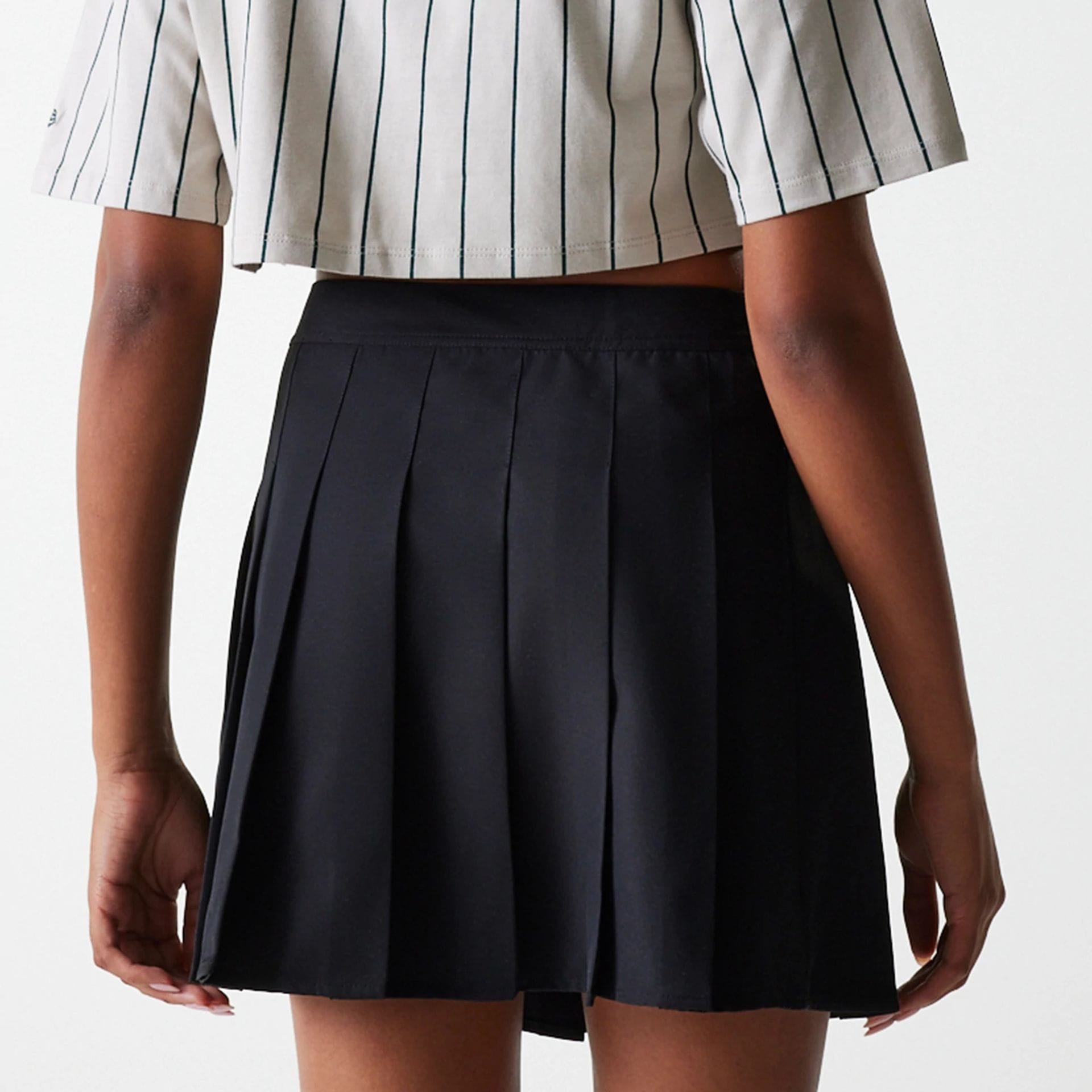 The Female model is wearing New York Yankees Womens MLB Black Tennis Skirt 7