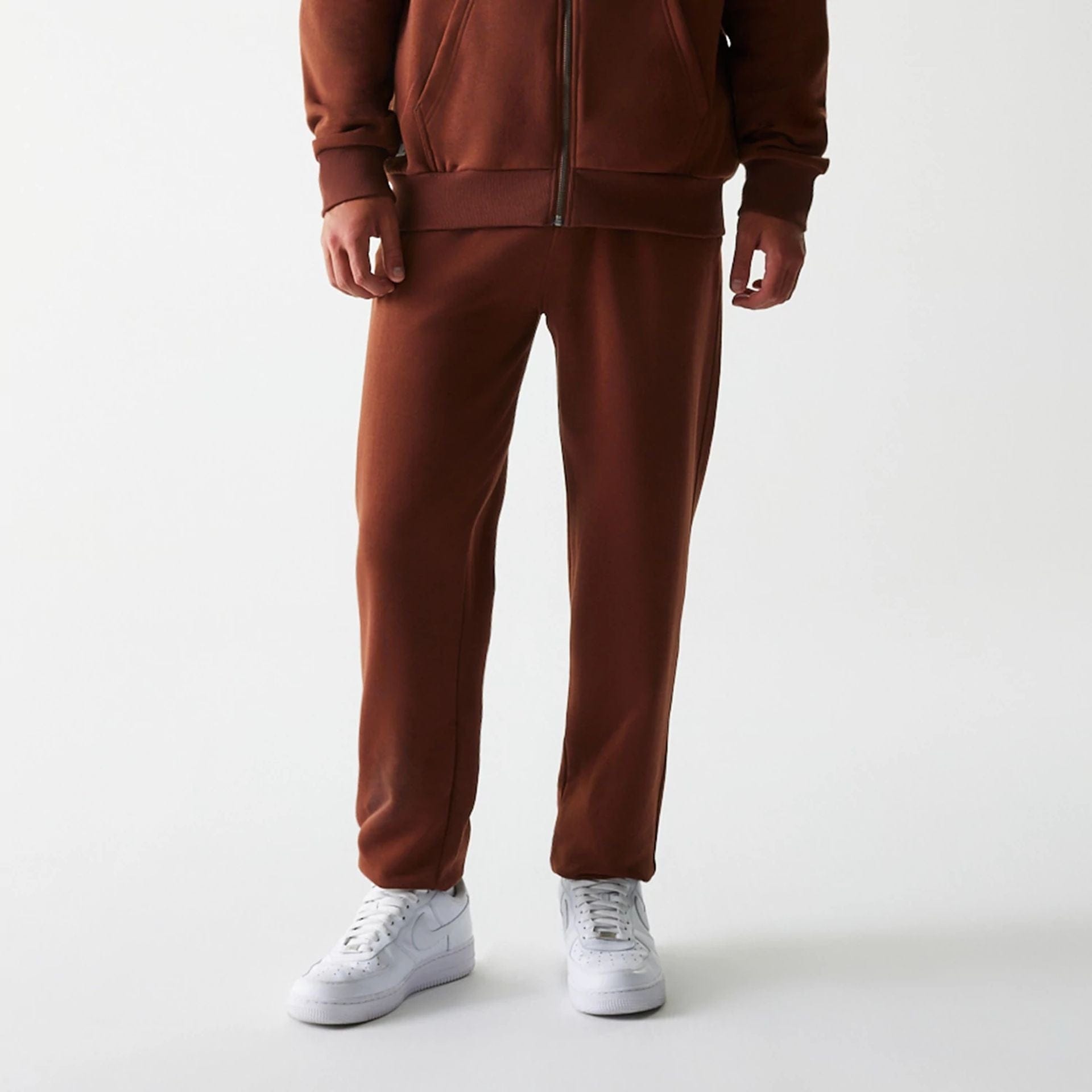 The Male model is wearing New York Yankees MLB Midi League Essential Brown Joggers 6