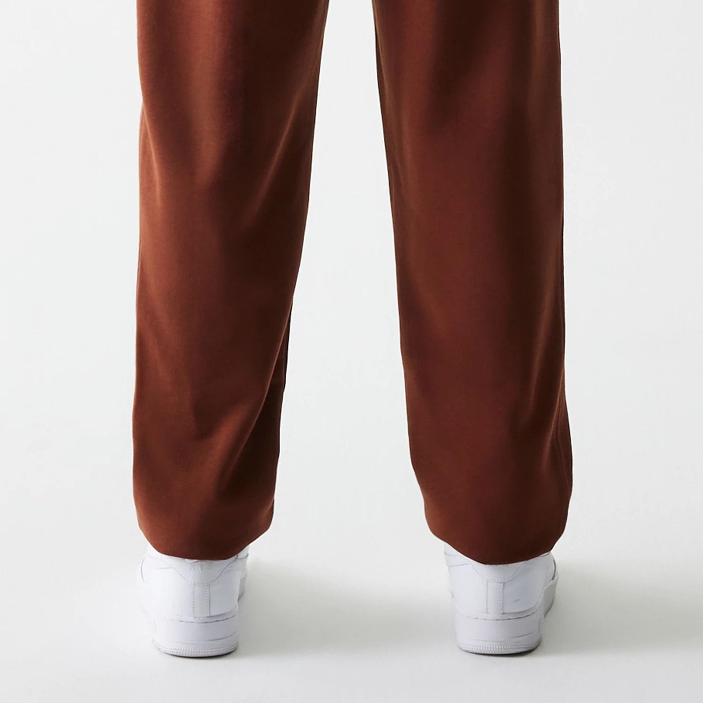 The Male model is wearing New York Yankees MLB Midi League Essential Brown Joggers 7