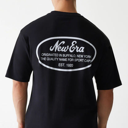 The Male model is wearing New Era Trucker Patch Black Oversized T-Shirt 4