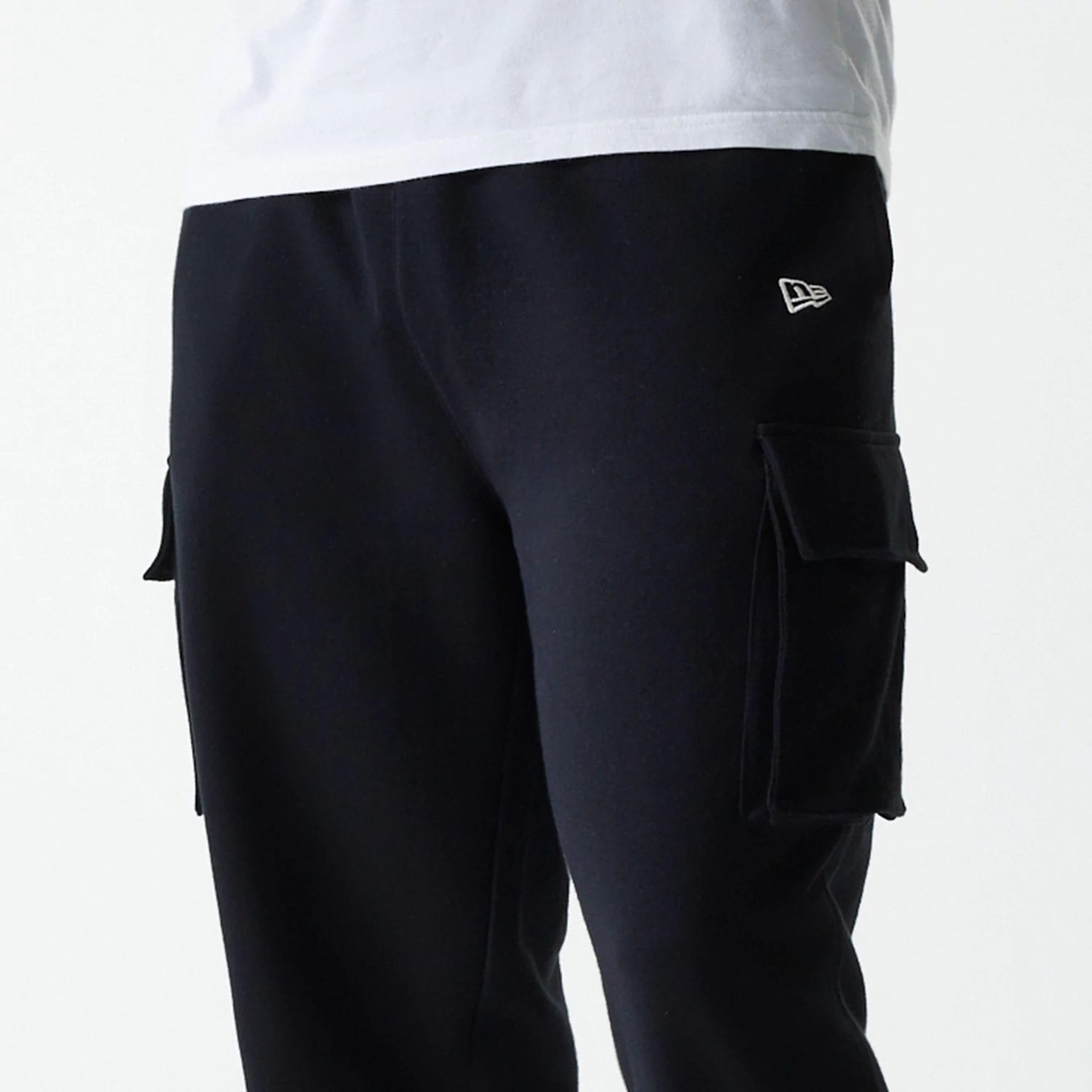 The Male model is wearing New Era Black Cargo Joggers 5