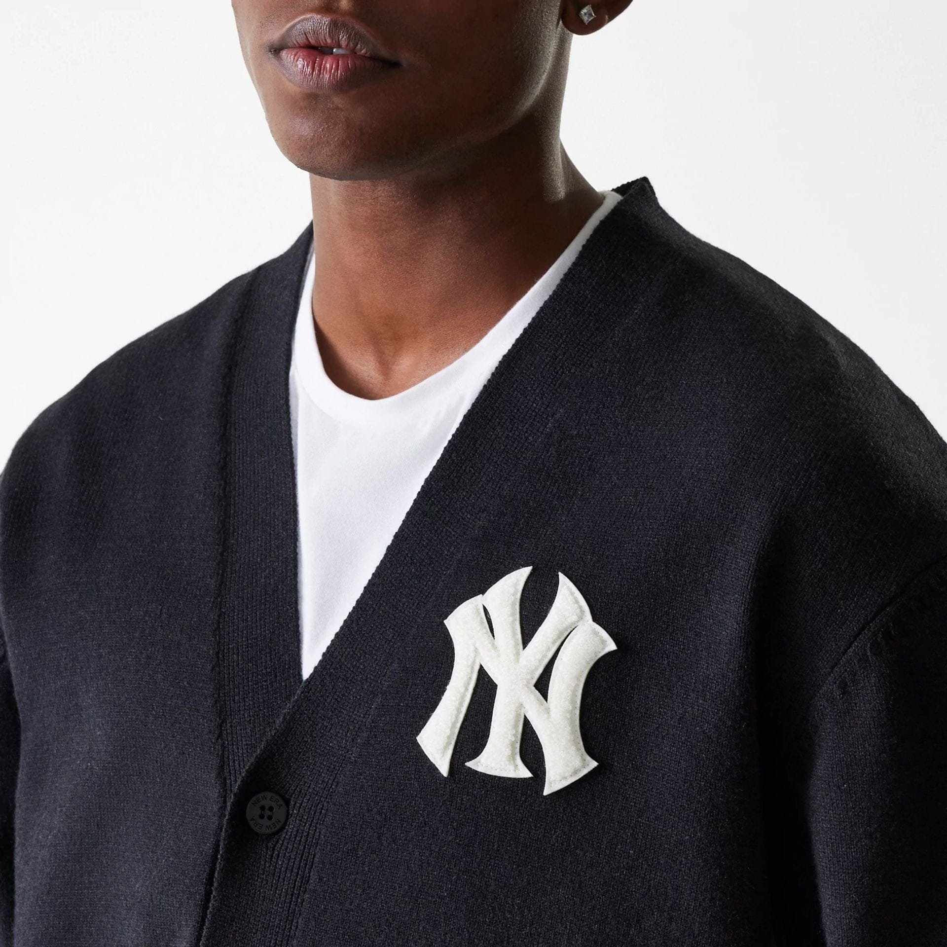 The Male model is wearing New York Yankees MLB Knit Black Cardigan 6