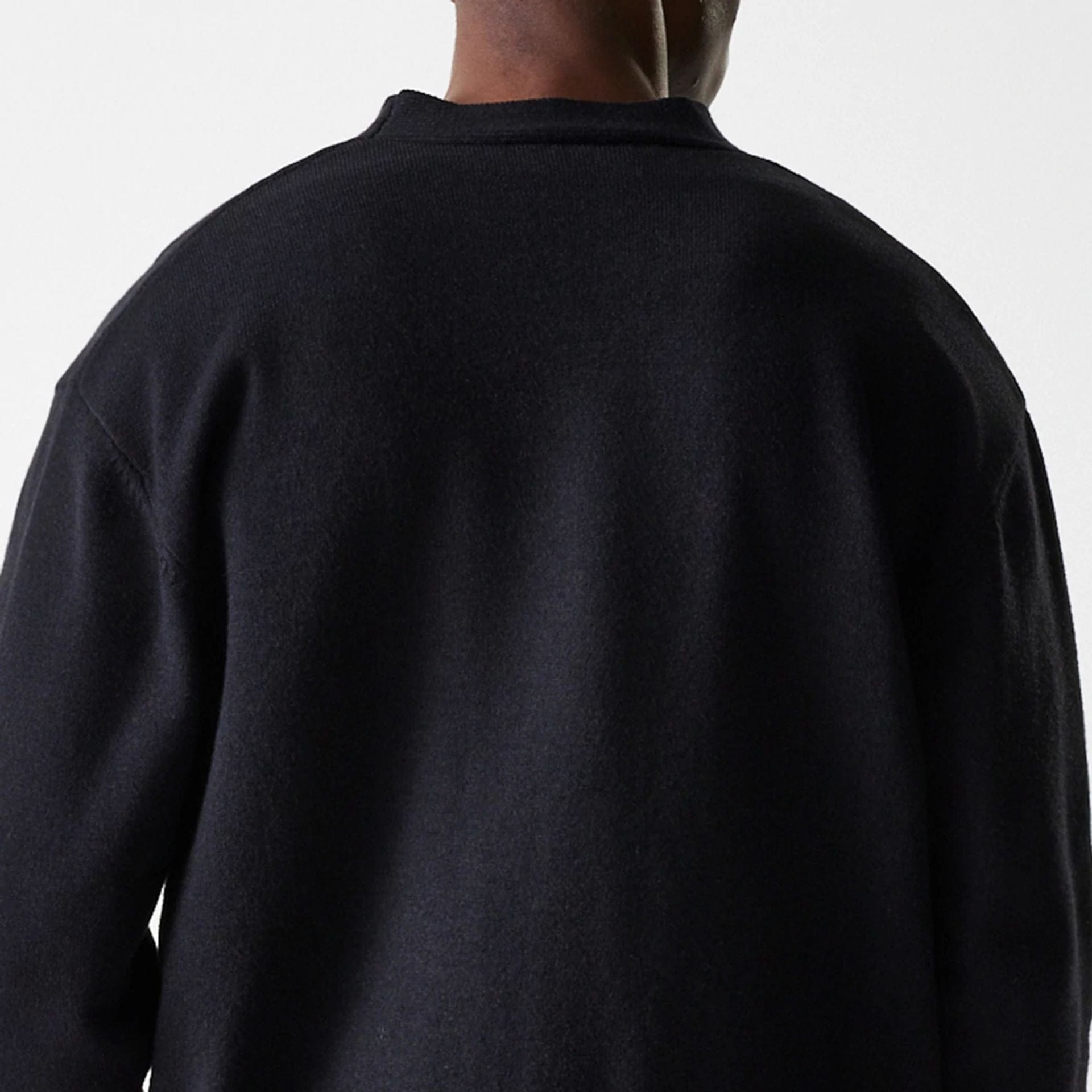 The Male model is wearing New York Yankees MLB Knit Black Cardigan 8