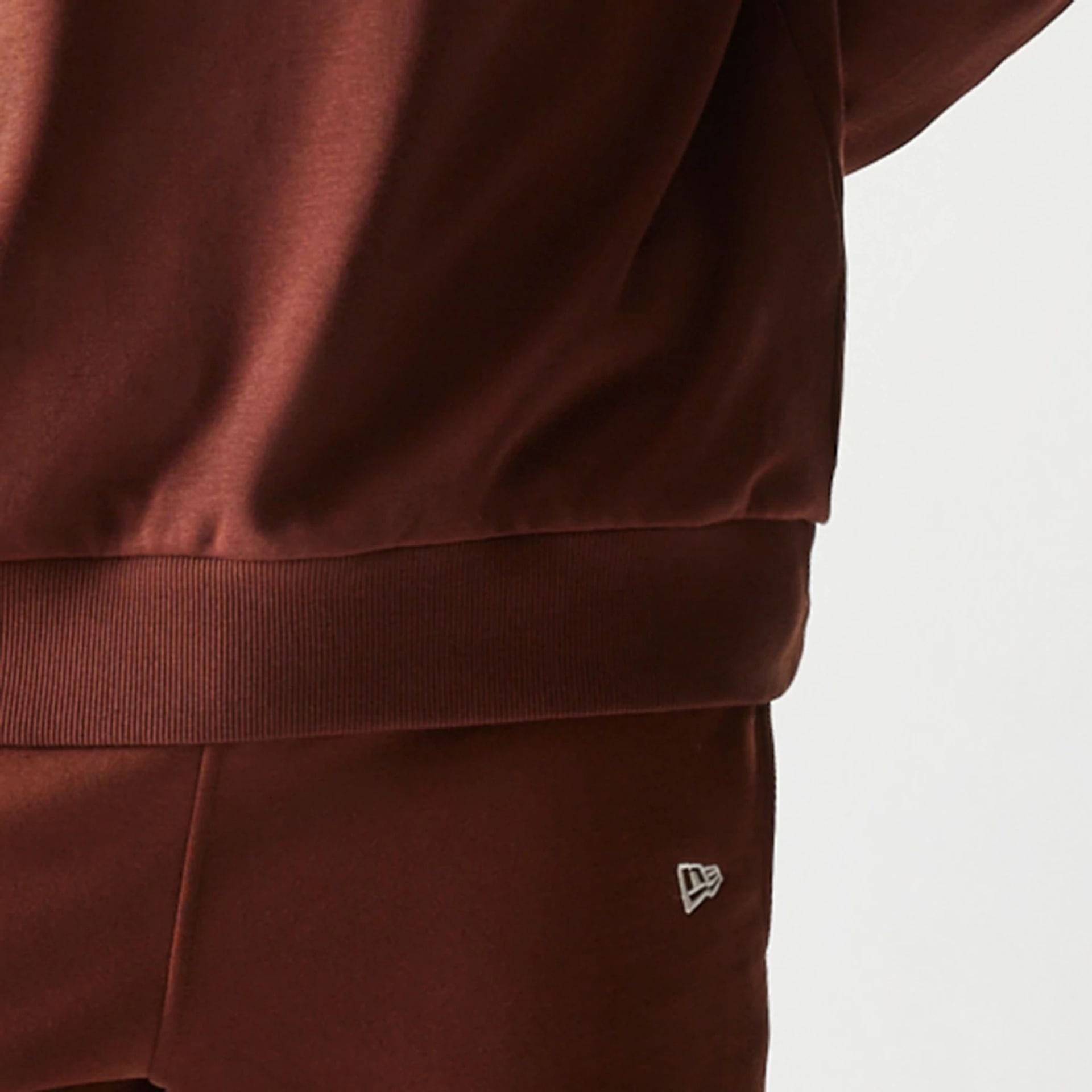 The Male model is wearing New York Yankees MLB Midi League Essential Brown Oversized Crew Neck Sweater 5