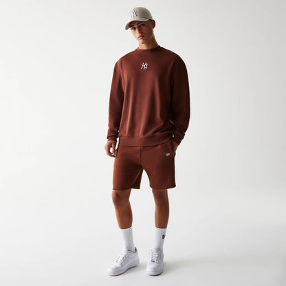 The Male model is wearing New York Yankees MLB Midi League Essential Brown Oversized Crew Neck Sweater 8