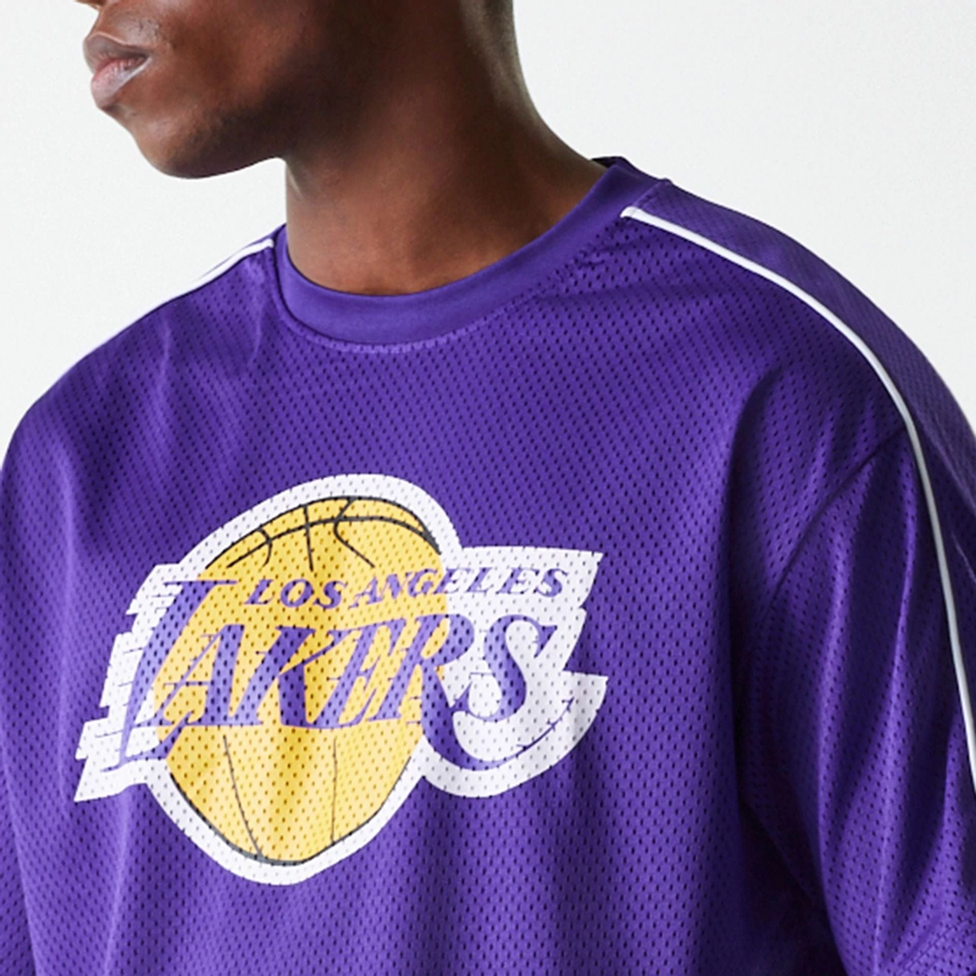 The Male model is wearing LA Lakers NBA Piping Purple Oversized Mesh T-Shirt 4